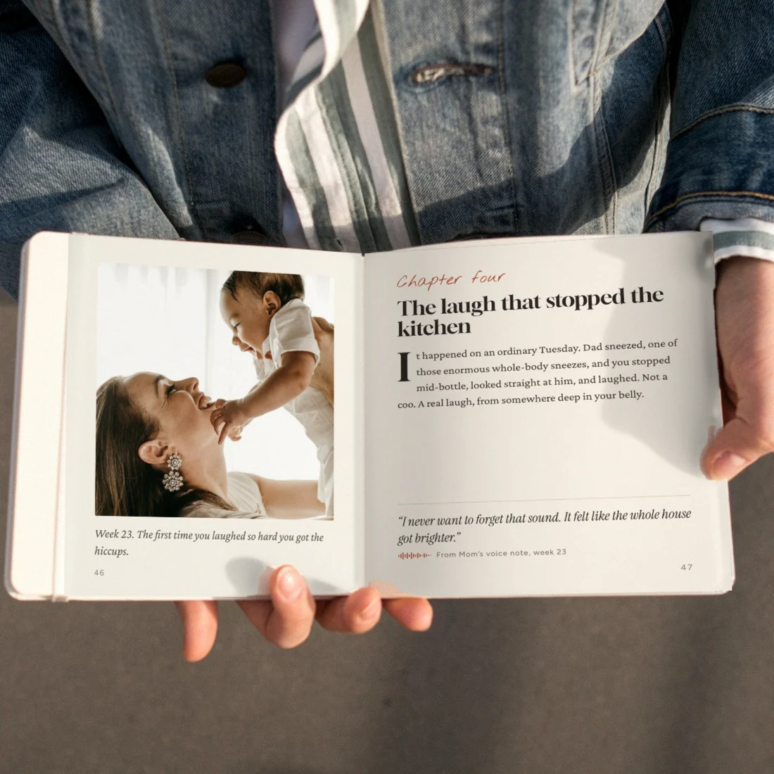 Hands holding an open Littlebound book with a photo page and a story page