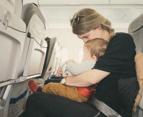 Mom and baby on their first flight