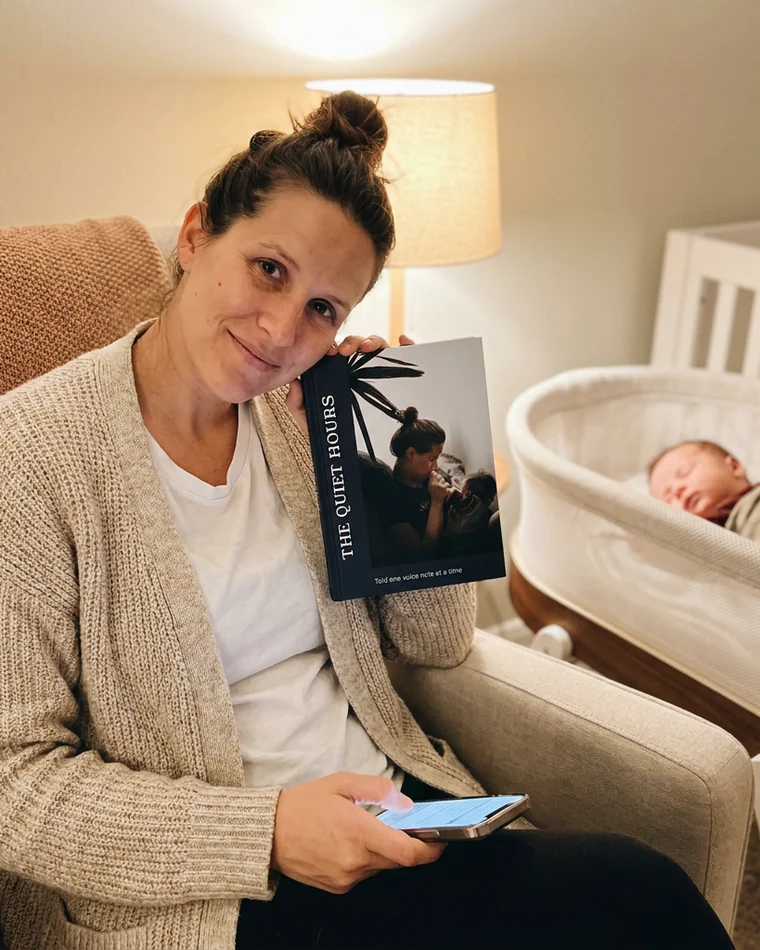 Mom in the nursery holding her The Quiet Hours book